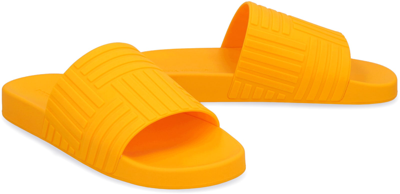 Shop Bottega Veneta Slider Rubber Slides In Tangerine