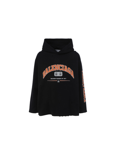 Shop Balenciaga Cropped Hoodie In Black/orange