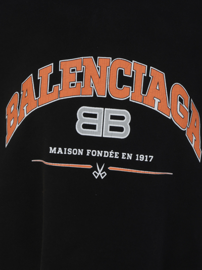 Shop Balenciaga Cropped Hoodie In Black/orange