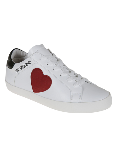 Shop Love Moschino Heart Patched Logo Sneakers In Bi+ne/cr.rosso