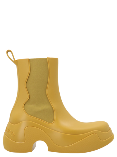 Shop Xocoi Medium Rubber Ankle Boots In Yellow