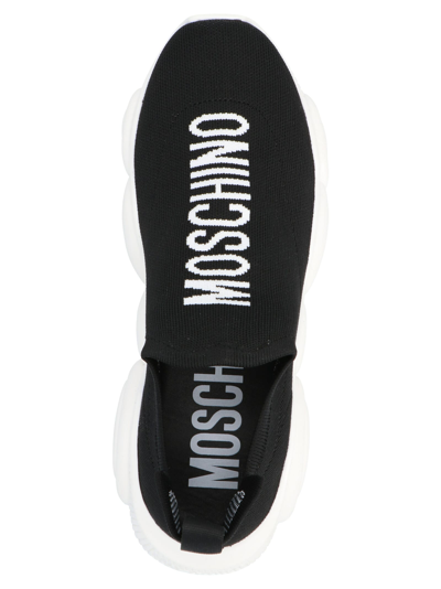 Shop Moschino Logo Sneakers In Black