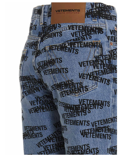 Shop Vetements Logo Print Jeans In Light Blue