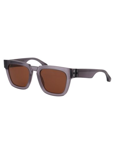 Shop Mykita Mmraw021 Sunglasses In 823 Raw Smoke | Brown Solid