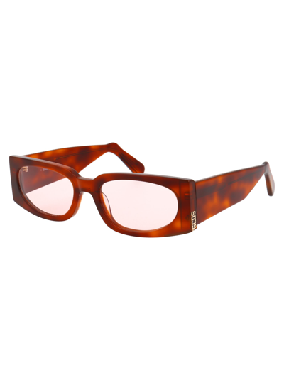 Shop Gcds Gd0016 Sunglasses In 53s Brown