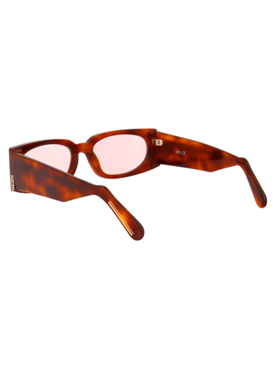 Shop Gcds Gd0016 Sunglasses In 53s Brown