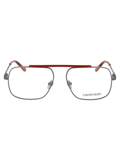 Shop Calvin Klein Ck18106 Glasses In 009 Gunmetal/brick