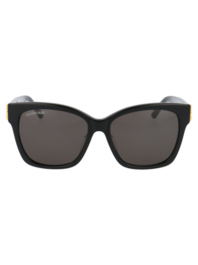 Shop Balenciaga Bb0102sa Sunglasses In 001 Black Gold Grey