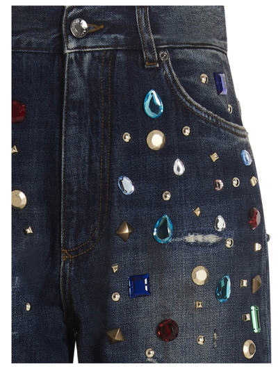 Shop Dolce & Gabbana Crystal Appliqués Jeans In Blue