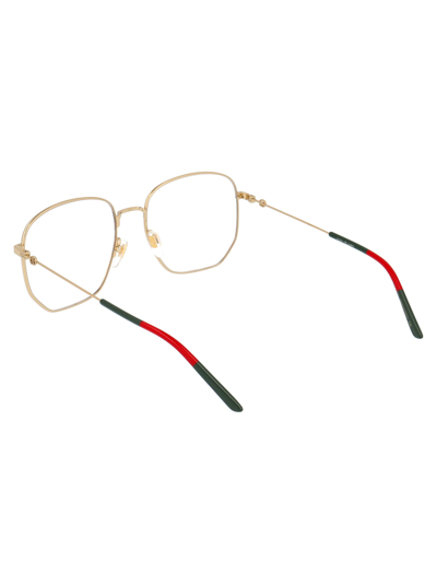 Shop Gucci Gg0396o Glasses In 001 Gold Gold Transparent