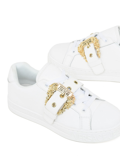 Shop Versace Jeans Couture Jeans Couture Low-top Leather Sneakers With Buckle Detail In White