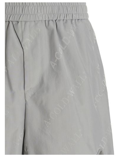 Shop A-cold-wall* All Over Logo Bermuda Shorts In Gray