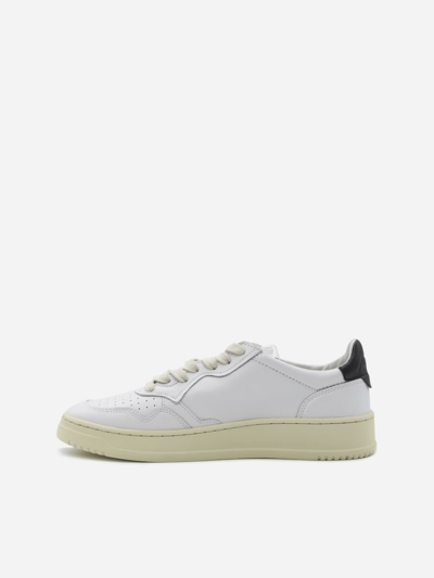 Shop Autry Leather Sneakers With Contrasting Heel Tab In White