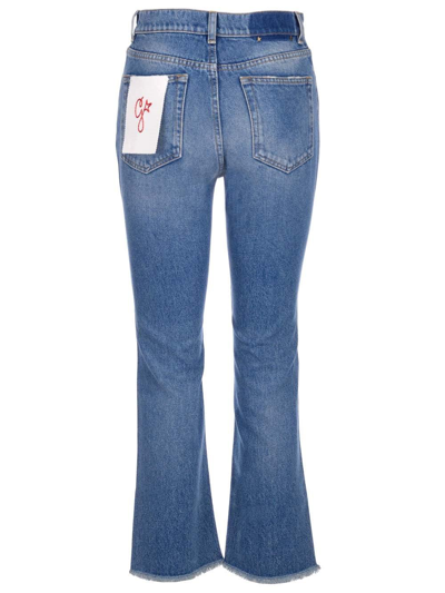Shop Golden Goose Logo Patch Flared Jeans In Blue