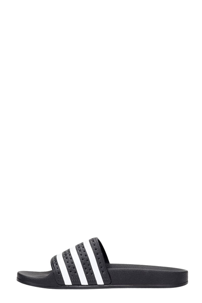 Shop Adidas Originals Adilette Flats In Black Rubber/plasic