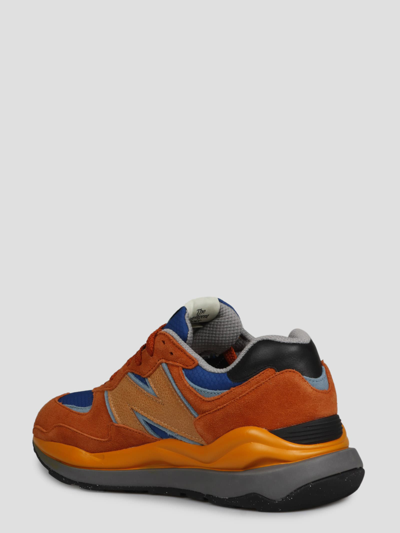 Shop New Balance 57/40 Sneakers In Rusty Red Orange Blue