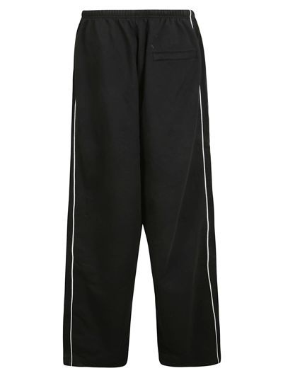 Shop Balenciaga Side Stripe Wide Leg Plain Trousers In Black