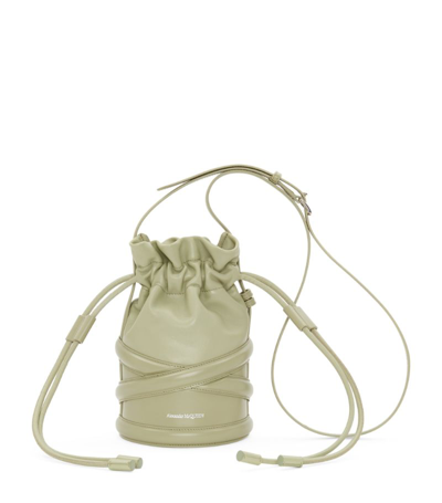 Shop Alexander Mcqueen Leather The Curve Drawstring Bucket Bag In Green