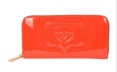 Shop Chiara Ferragni Logo Debossed Continental Zipped Wallet In Orange