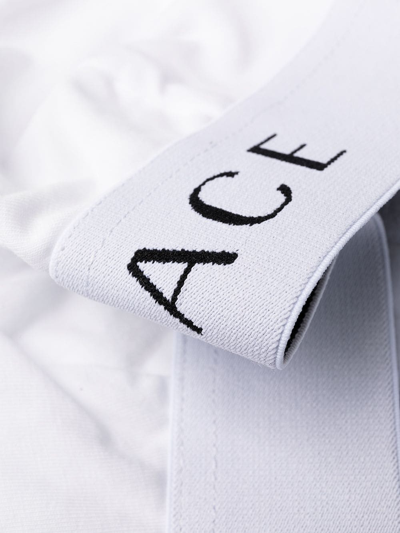 Shop Versace Bralette A Triangolo Con Logo In White
