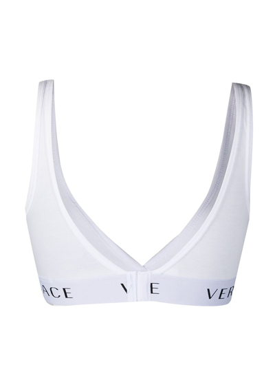 Shop Versace Bralette A Triangolo Con Logo In White