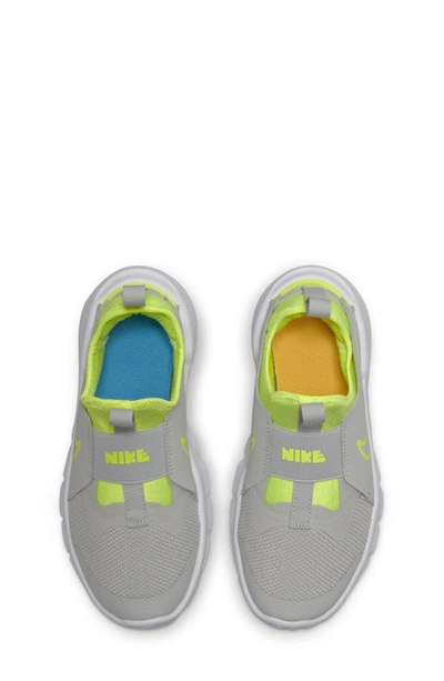 Shop Nike Flex Runner 2 Slip-on Running Shoe In Grey Fog/ Volt/ Blue