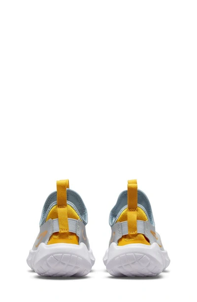 Shop Nike Kids' Flex Runner 2 Slip-on Running Shoe In Aura/ Gold/ Phantom