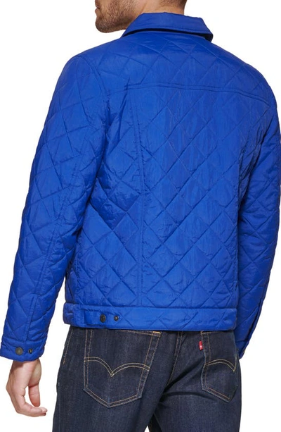 Shop Levi's Diamond Quilted Nylon Trucker Jacket In Blue