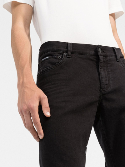 Shop Dolce & Gabbana Brushstroke-print Slim-fit Jeans In Black