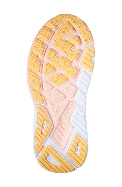 Shop Hoka Arahi 6 Running Shoe In Sun Baked / Shell Coral