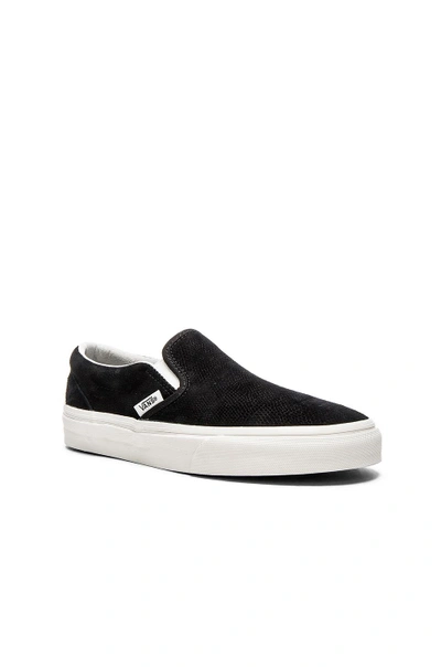 Shop Vans Classic Slip On Sneaker In Black