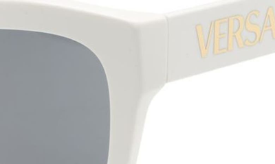 Shop Versace 56mm Cat Eye Sunglasses In White/dark Grey