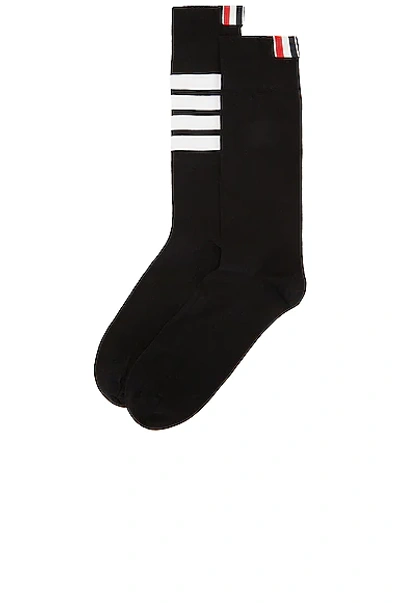 Shop Thom Browne 4 Bar Stripe Mid Calf Socks In Black