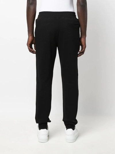 Shop Versace Jeans Couture Logo Print Track Pants In Black