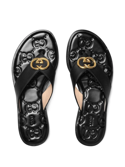 Shop Gucci Interlocking G Thong-strap Sandals In Schwarz