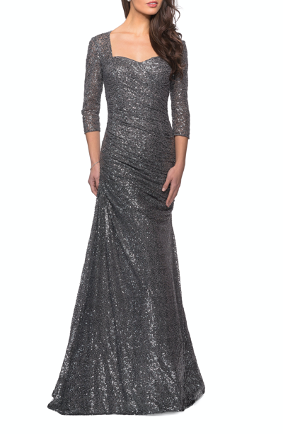Shop La Femme Floor Length Sequin Gown With Ruching And Sleeves In Grey