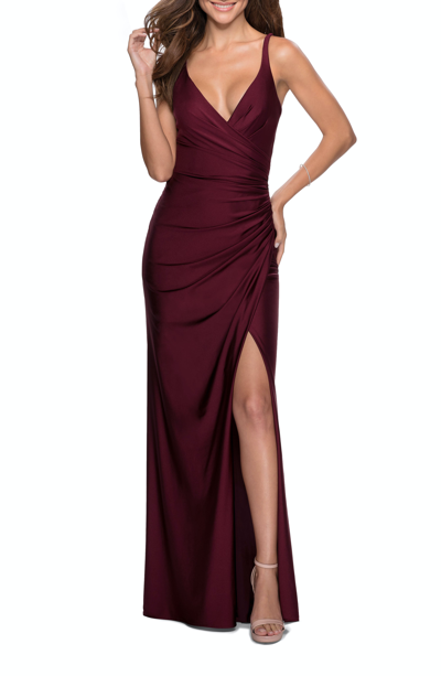 Shop La Femme Ruched Jersey Prom Dress With Tie Up Back In Purple