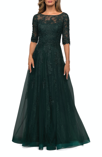 Shop La Femme Lace And Tulle A-line Gown With Three Quarter Sleeves In Green