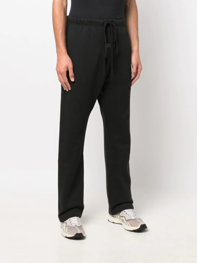 Essentials Logo Print Track Pants In Black