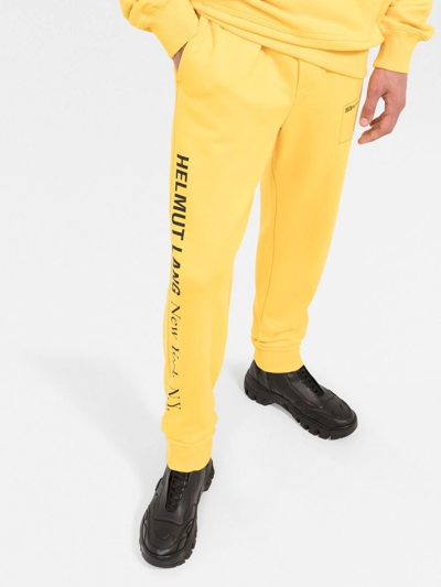 Shop Helmut Lang New York Postcard Track Trousers In Yellow