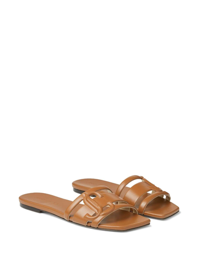 Shop Jimmy Choo Laran Debossed-logo Sandals In Brown