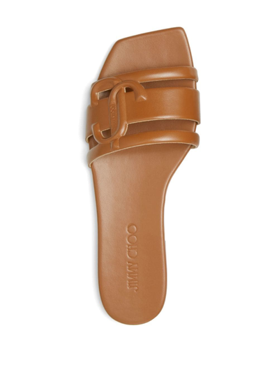 Shop Jimmy Choo Laran Debossed-logo Sandals In Brown