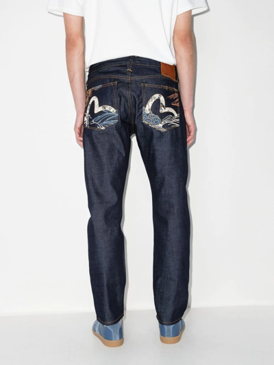 Shop Evisu Graphic-print Straight-leg Jeans In Blue
