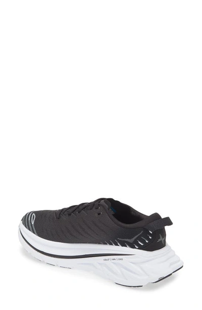 Shop Hoka Bondi X Running Shoe In Black / White