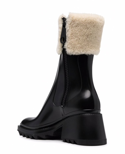 Shop Chloé Betty Shearling Rain Boots In Black