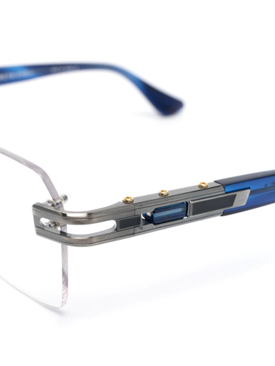 Shop Dita Eyewear Rimless Square-frame Glasses In Blue