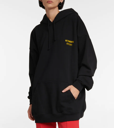 Shop Vetements Logo Cotton-blend Hoodie In Black