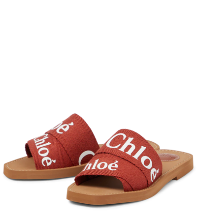 Shop Chloé Woody Canvas Slides In Terracotta Red