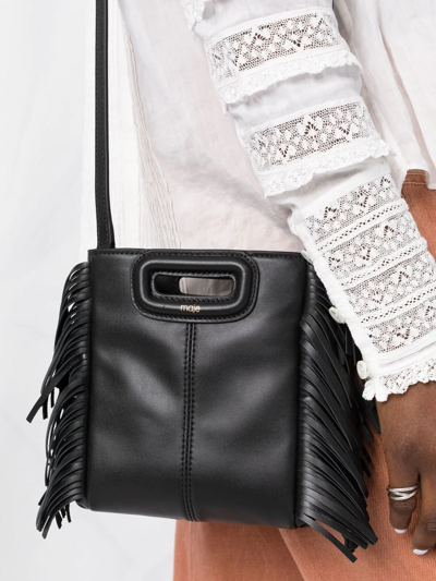 Shop Maje M Fringed Crossbody Bag In Schwarz