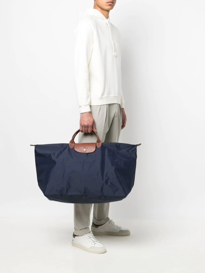 Shop Longchamp Large Le Pliage Travel Bag In Blue